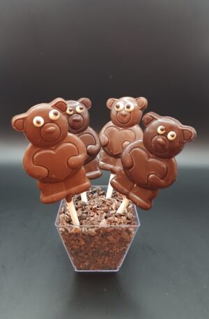 Sucettes en chocolat, gourmandises sucrées sur bâtonnet.